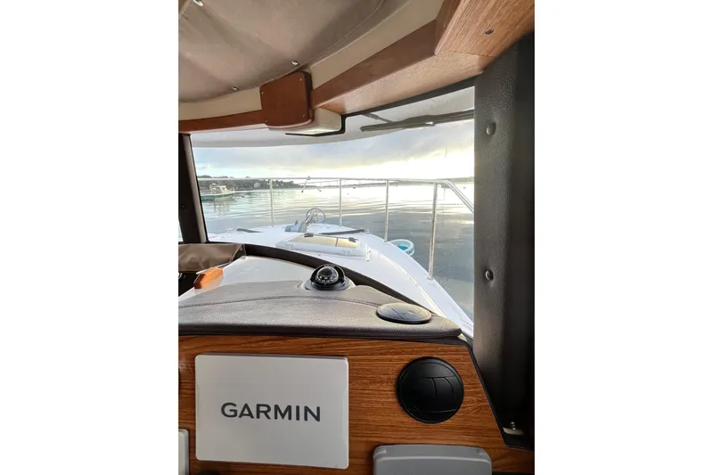 Skylark Yacht Photos Pics Interior view of 2025 Ranger Tugs R23 boat with Garmin navigation system.