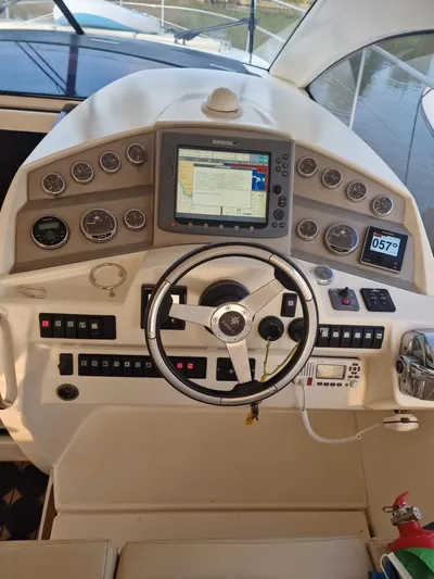  Yacht Photos Pics Helm of 2008 Jeanneau Prestige 38 S. yacht with navigation controls and display.