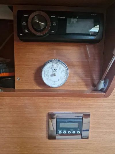  Yacht Photos Pics Control panel of 2008 Jeanneau Prestige 38 S. yacht with stereo and gauge.