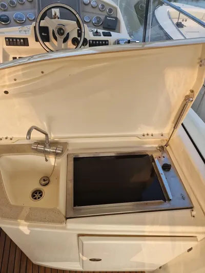  Yacht Photos Pics 2008 Jeanneau Prestige 38 S yacht cockpit with sink and stove.