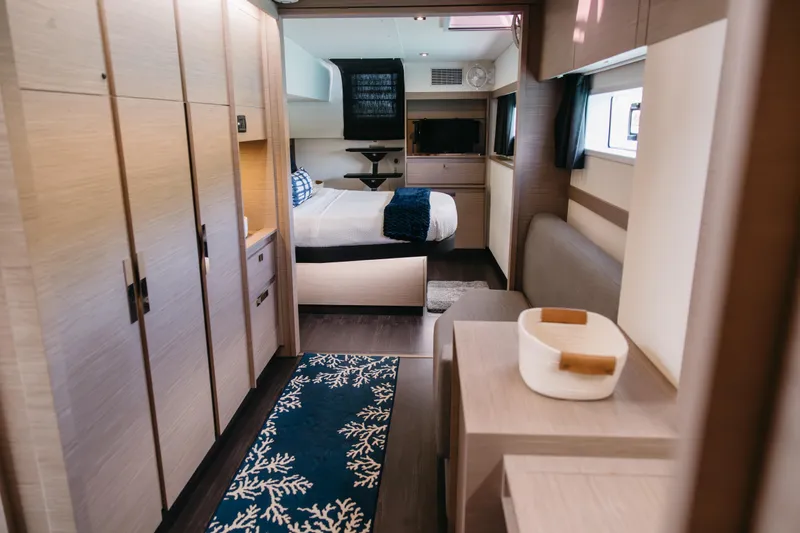 Amajen Yacht Photos Pics Luxurious interior of 2022 Fountaine Pajot Aura 51 yacht cabin with modern furnishings.