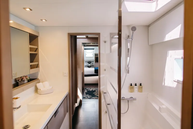 Amajen Yacht Photos Pics Luxurious bathroom interior of 2022 Fountaine Pajot Aura 51 yacht, featuring modern amenities.