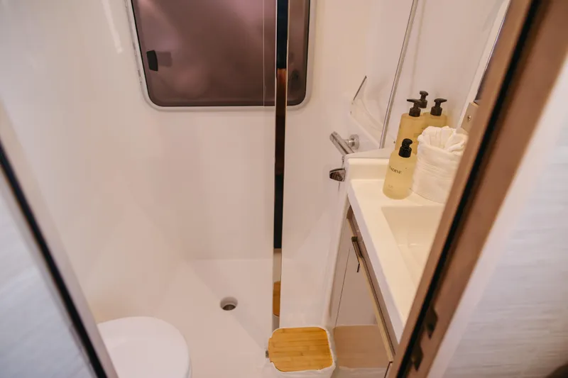 Amajen Yacht Photos Pics Bathroom interior of 2022 Fountaine Pajot Aura 51 yacht, featuring modern amenities.