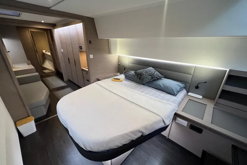 Amajen Yacht Photos Pics Luxurious bedroom interior of 2022 Fountaine Pajot Aura 51 yacht with modern design.