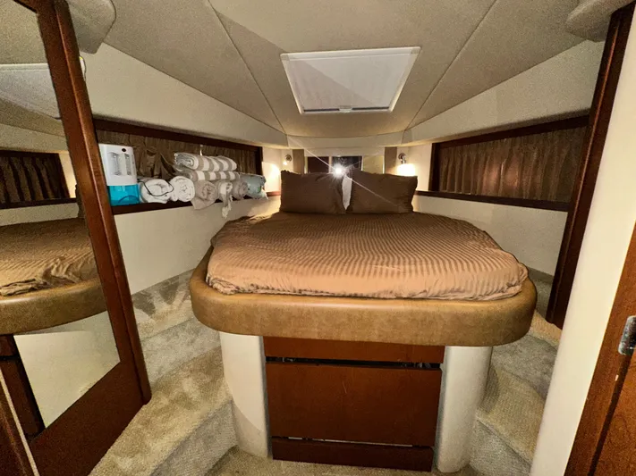 Bad Kitty Yacht Photos Pics Luxurious cabin interior of 2007 Sea Ray 380 Sundancer yacht with cozy bedding.