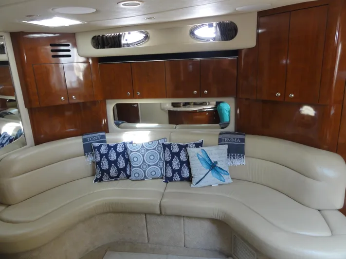  Yacht Photos Pics Luxurious interior of 2003 Sea Ray 380 Sundancer with plush seating and decorative pillows.