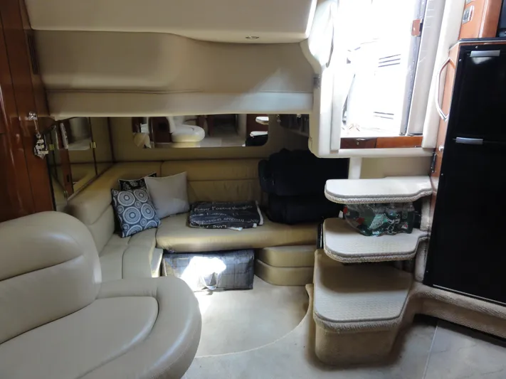  Yacht Photos Pics Interior of 2003 Sea Ray 380 Sundancer yacht with beige seating and modern design.