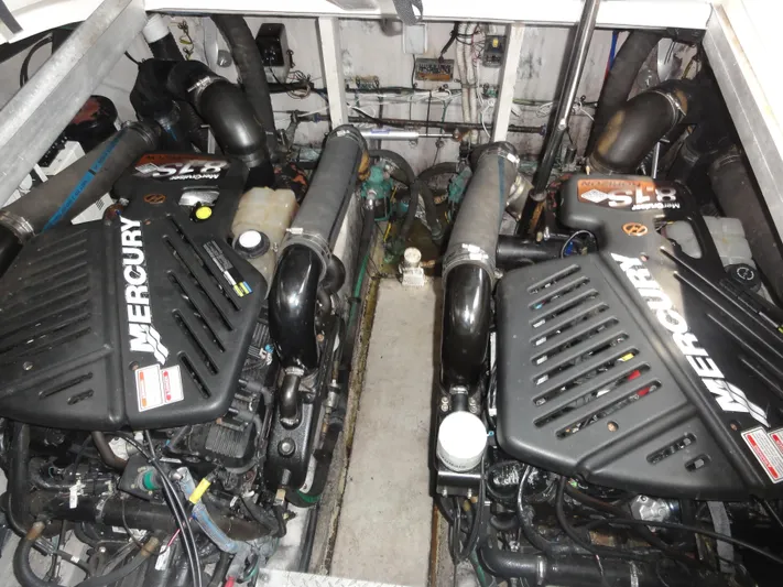  Yacht Photos Pics Engine room of 2003 Sea Ray 380 Sundancer with twin Mercury engines.