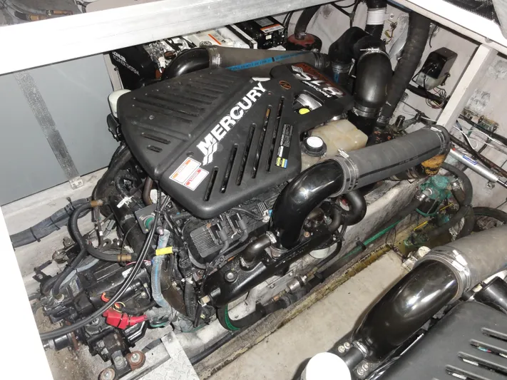  Yacht Photos Pics Engine compartment of a 2003 Sea Ray 380 Sundancer with a Mercury engine.