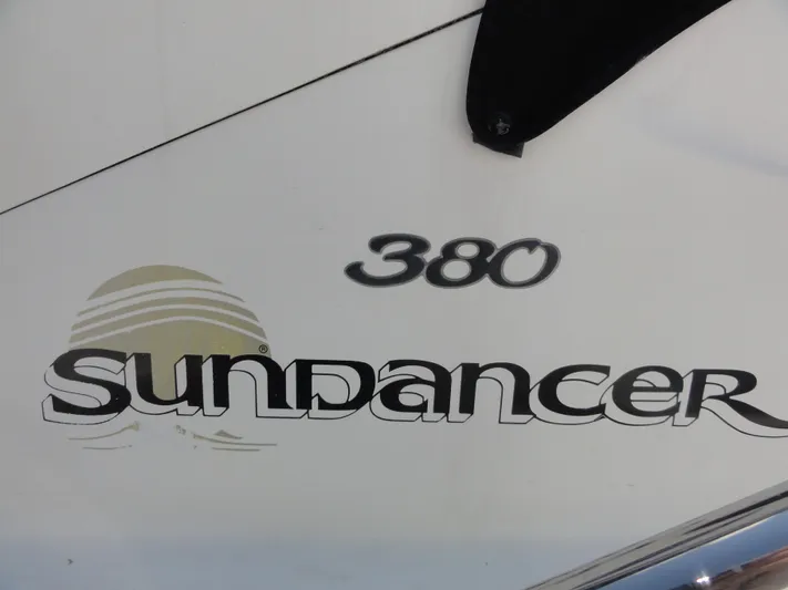  Yacht Photos Pics 2003 Sea Ray 380 Sundancer logo on boat exterior.