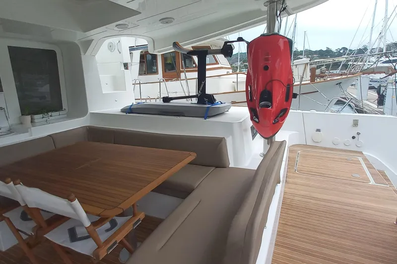 Amea Yacht Photos Pics Spacious deck of 2014 Lagoon 52 F yacht with seating and water sports equipment.