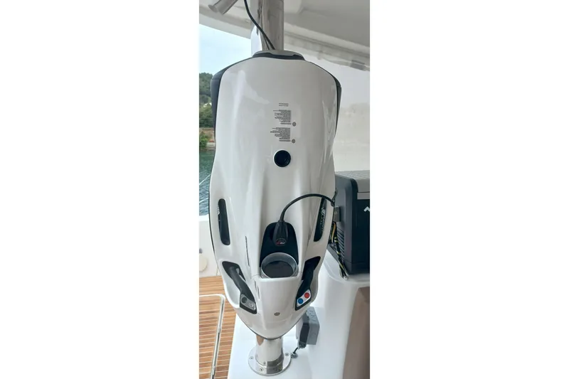 Amea Yacht Photos Pics Close-up of a 2014 Lagoon 52 F yacht's steering column and controls.