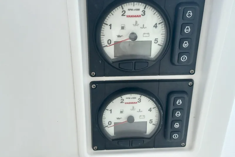 Amea Yacht Photos Pics Yanmar RPM gauges on a 2014 Lagoon 52 F yacht control panel.
