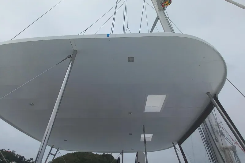 Amea Yacht Photos Pics 2014 Lagoon 52 F catamaran deck view with overcast sky.