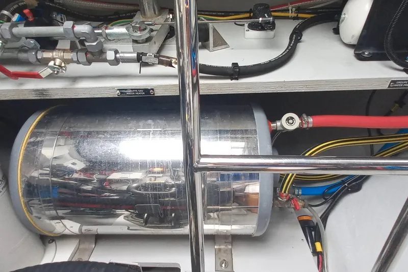 Amea Yacht Photos Pics Engine room of 2014 Lagoon 52 F yacht with water heater and piping system.