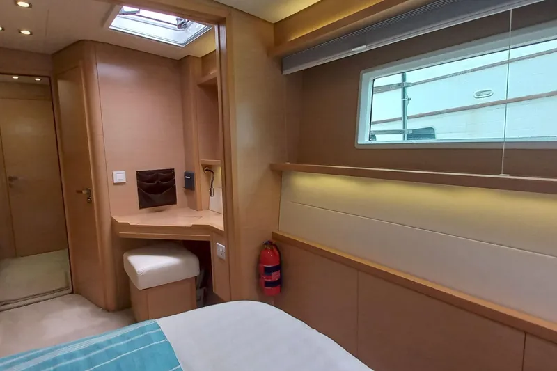 Amea Yacht Photos Pics Luxurious interior of 2014 Lagoon 52 F yacht cabin with modern furnishings.