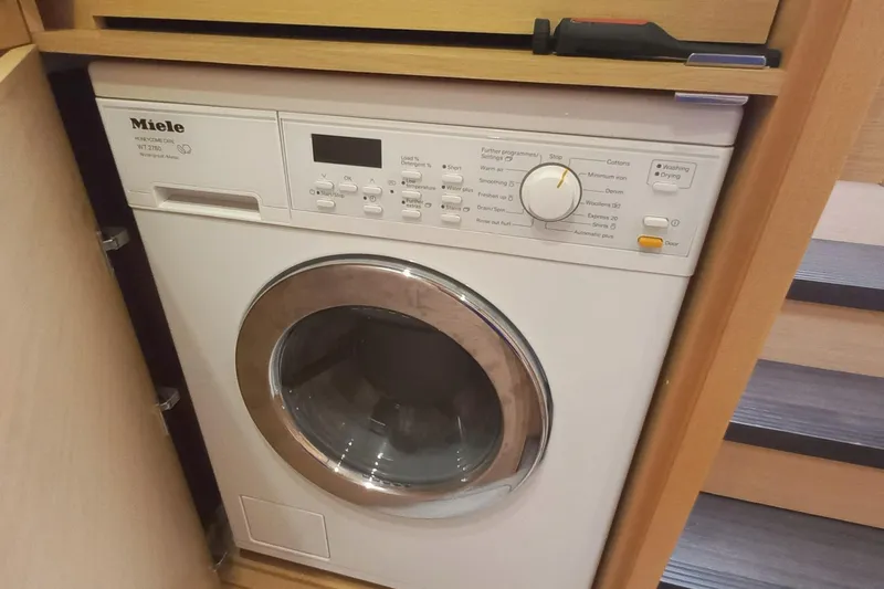 Amea Yacht Photos Pics Miele washing machine in Lagoon 52 F yacht, 2014 model, compact installation.