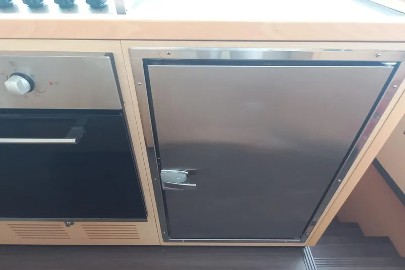 Amea Yacht Photos Pics Stainless steel kitchen appliance in 2014 Lagoon 52 F yacht interior.