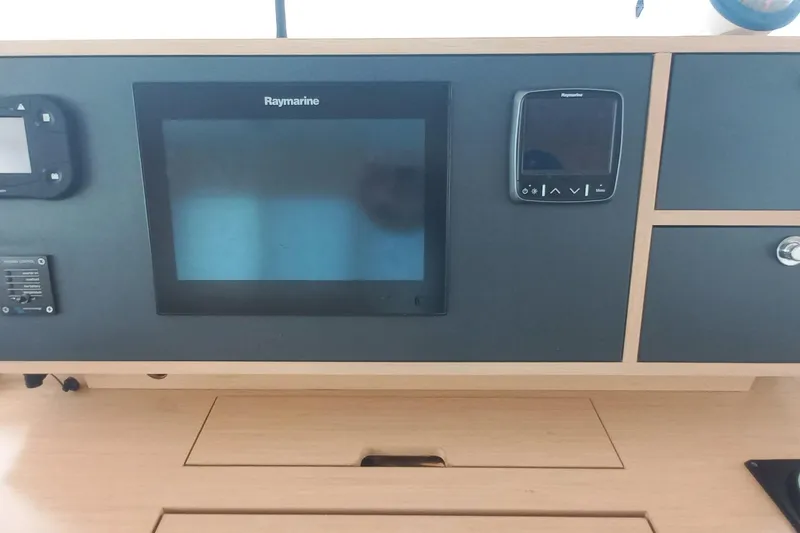 Amea Yacht Photos Pics Control panel of a 2014 Lagoon 52 F yacht with Raymarine displays.