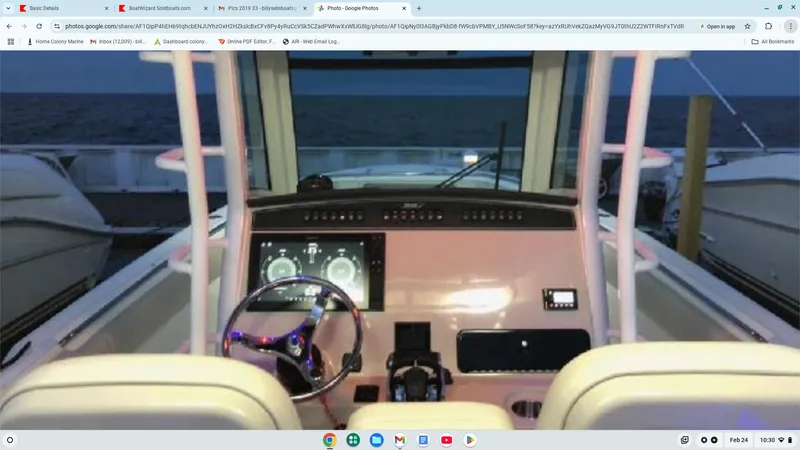  Yacht Photos Pics 2019 Boston Whaler 330 Outrage helm with modern controls and ocean view.