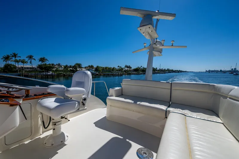 Twelve Bar Blues Yacht Photos Pics Flybridge of 2019 Hinckley Talaria 43, featuring luxurious seating and ocean view.