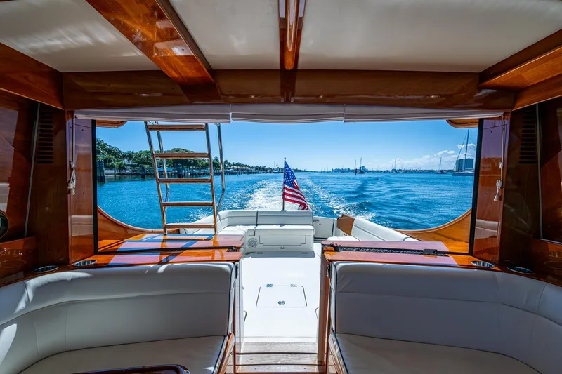 Twelve Bar Blues Yacht Photos Pics Hinckley Talaria 43 Flybridge 2019 yacht interior with ocean view and American flag.