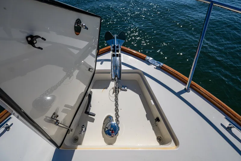 Twelve Bar Blues Yacht Photos Pics Anchor compartment of 2019 Hinckley Talaria 43 Flybridge yacht on water.