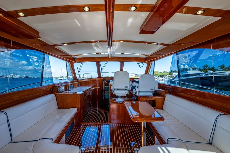 Twelve Bar Blues Yacht Photos Pics Luxurious interior of 2019 Hinckley Talaria 43 Flybridge yacht with elegant wood finishes.