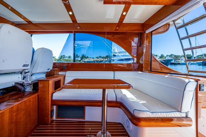 Twelve Bar Blues Yacht Photos Pics Luxurious interior of 2019 Hinckley Talaria 43 Flybridge yacht with elegant wood finish.