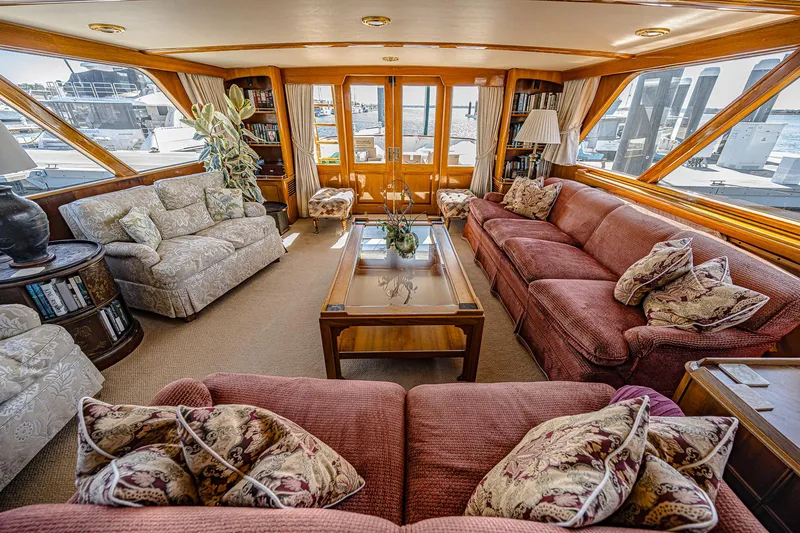 Diday Yacht Photos Pics Luxurious 1984 Burger 91 yacht interior with plush seating and elegant decor.