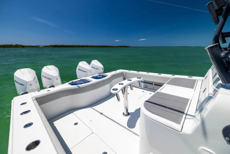  Yacht Photos Pics 2021 Freeman 42 LR boat with quad engines on turquoise water.