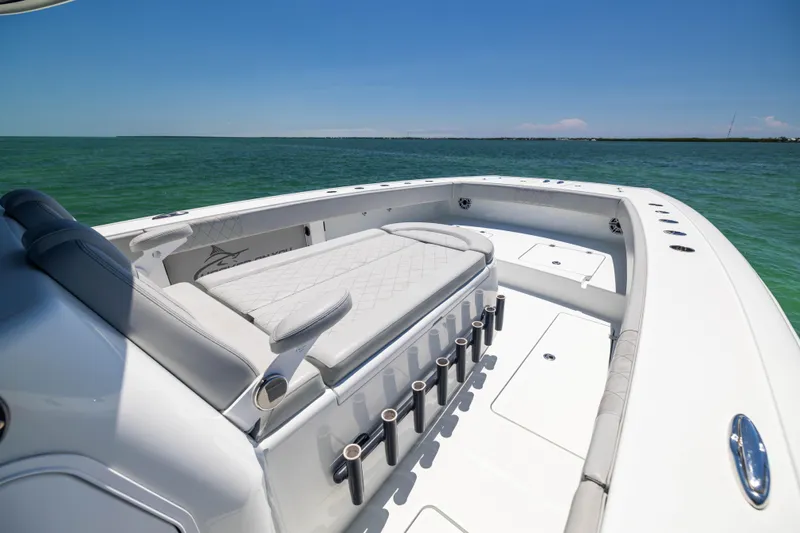  Yacht Photos Pics 2021 Freeman 42 LR boat interior with seating, rod holders, and ocean view.