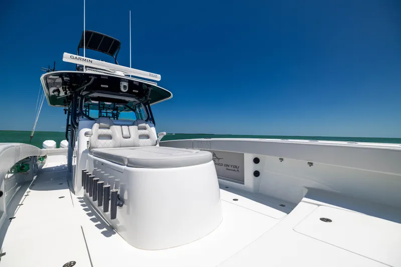  Yacht Photos Pics 2021 Freeman 42 LR boat with sleek design, spacious deck, and modern amenities under clear blue sky.