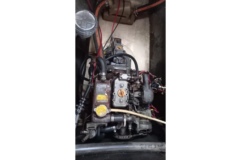 Dreamteam Yacht Photos Pics Engine of a 1993 Fountaine Pajot Antigua 37 catamaran, showing mechanical components and wiring.