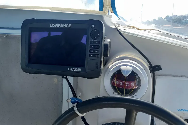 Dreamteam Yacht Photos Pics Boat cockpit with Lowrance HDS7 display and compass, Fountaine Pajot Antigua 37, 1993 model.