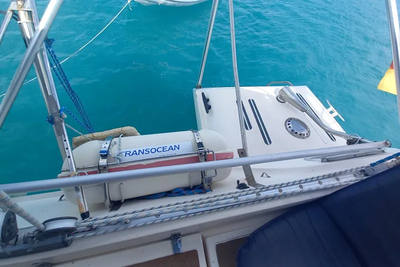 Dreamteam Yacht Photos Pics Fountaine Pajot Antigua 37 yacht deck with Transocean equipment, 1993 model, on turquoise water.