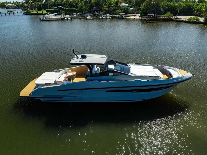 Yacht Photos Pics 2024 Rio Yachts Daytona 50 luxury yacht on calm water, side view.