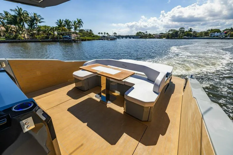  Yacht Photos Pics 2024 Rio Yachts Daytona 50 deck with seating, cruising on a sunny day.