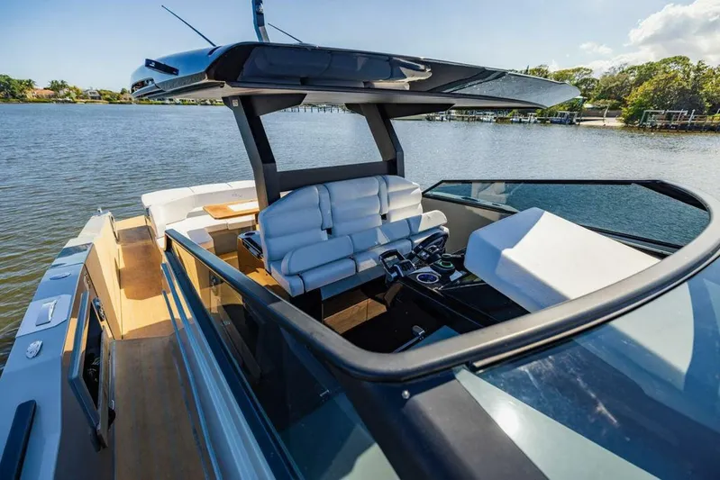 Yacht Photos Pics 2024 Rio Yachts Daytona 50, luxury deck view, modern seating, sleek design, on calm water.
