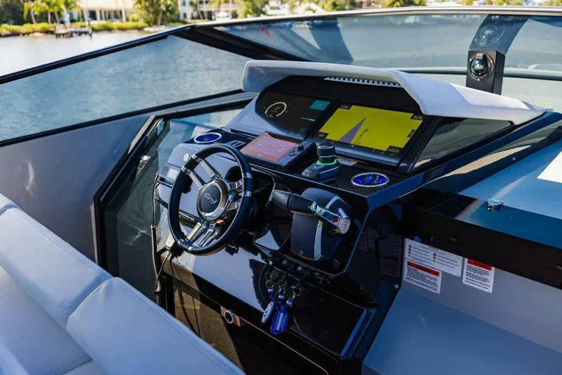 Yacht Photos Pics 2024 Rio Yachts Daytona 50 helm with modern navigation system and sleek design.