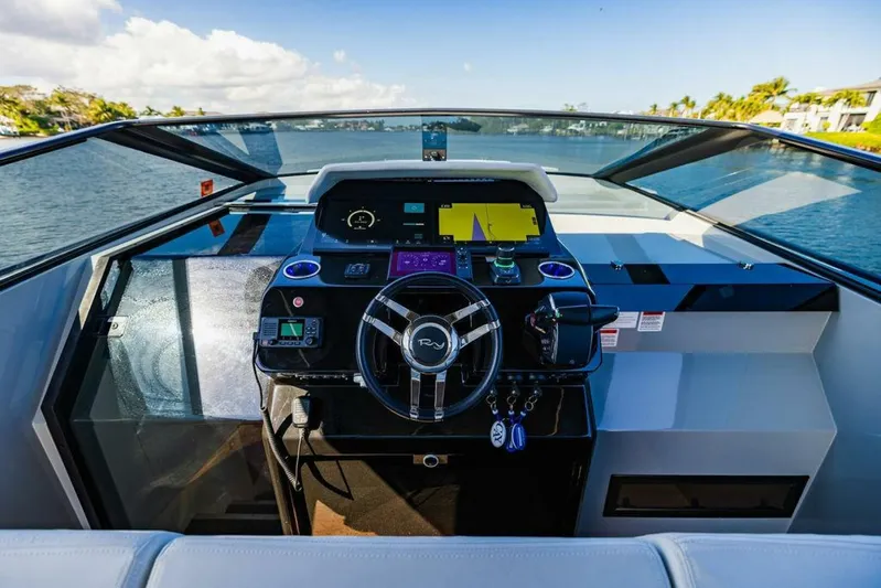  Yacht Photos Pics 2024 Rio Yachts Daytona 50 helm with modern controls and panoramic water view.