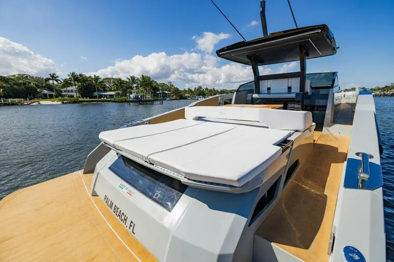  Yacht Photos Pics 2024 Rio Yachts Daytona 50 luxury yacht on a sunny waterfront.