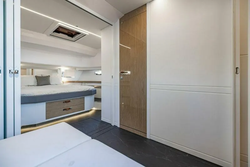  Yacht Photos Pics Luxurious interior of 2024 Rio Yachts Daytona 50, featuring modern bedroom design.