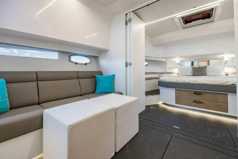  Yacht Photos Pics Luxurious interior of 2024 Rio Yachts Daytona 50 with modern seating and elegant bedroom.