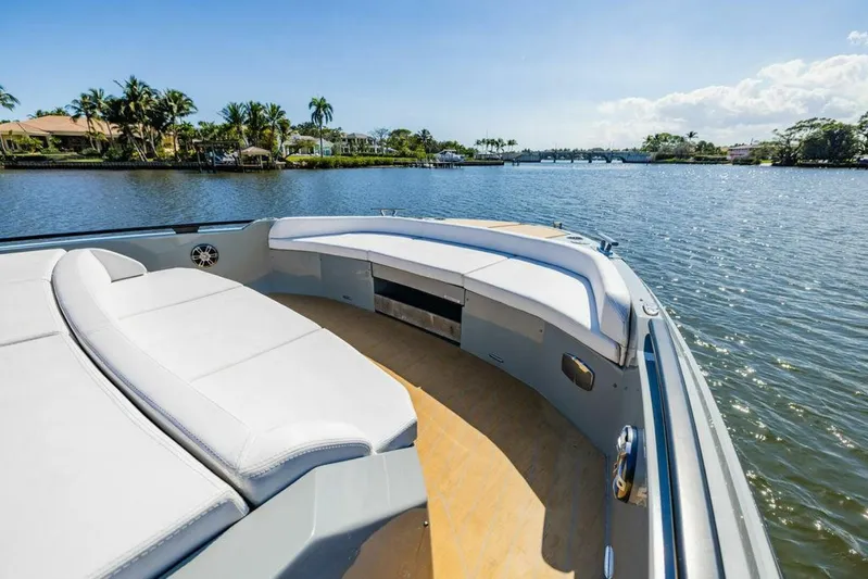  Yacht Photos Pics 2024 Rio Yachts Daytona 50, luxurious deck view on a serene waterway.