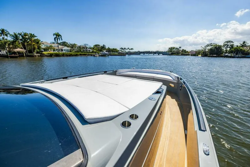  Yacht Photos Pics 2024 Rio Yachts Daytona 50 cruising on a sunny, scenic waterway.
