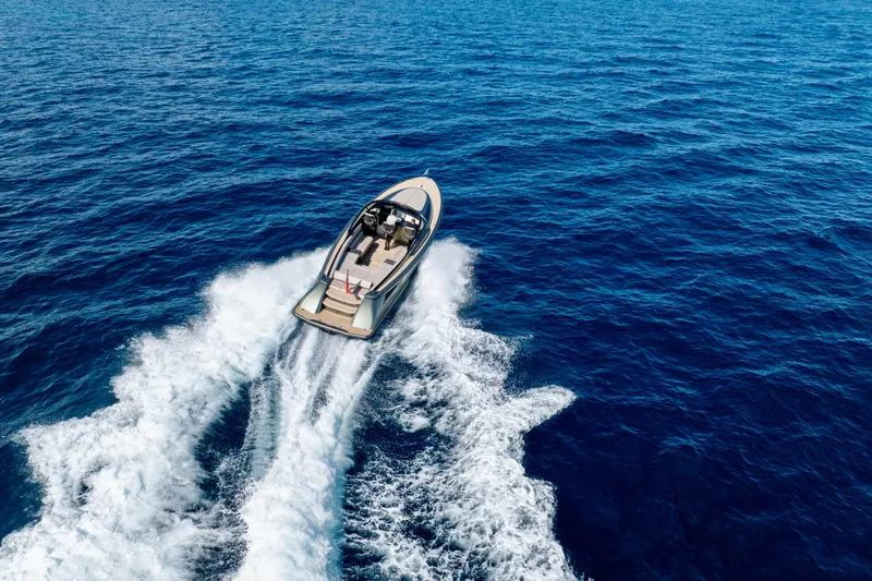 Madeleine Yacht Photos Pics 2024 Wajer 38 yacht cruising on open blue sea, creating white wake.