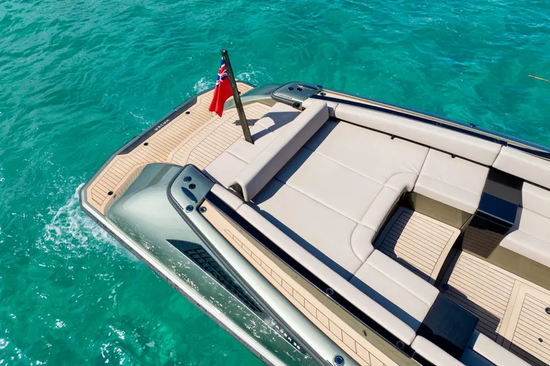 Madeleine Yacht Photos Pics 2024 Wajer 38 luxury yacht on turquoise water, featuring sleek design and spacious deck.