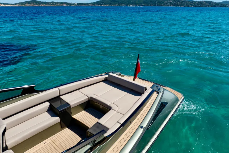 Madeleine Yacht Photos Pics 2024 Wajer 38 yacht on clear blue water, featuring luxurious seating and sleek design.