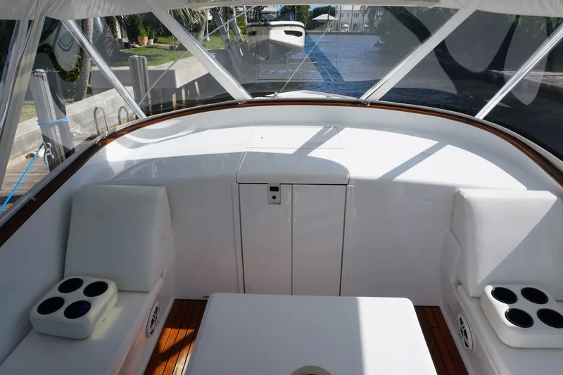  Yacht Photos Pics 2010 Scopinich 35 EXPRESS boat interior with white seating and cup holders.